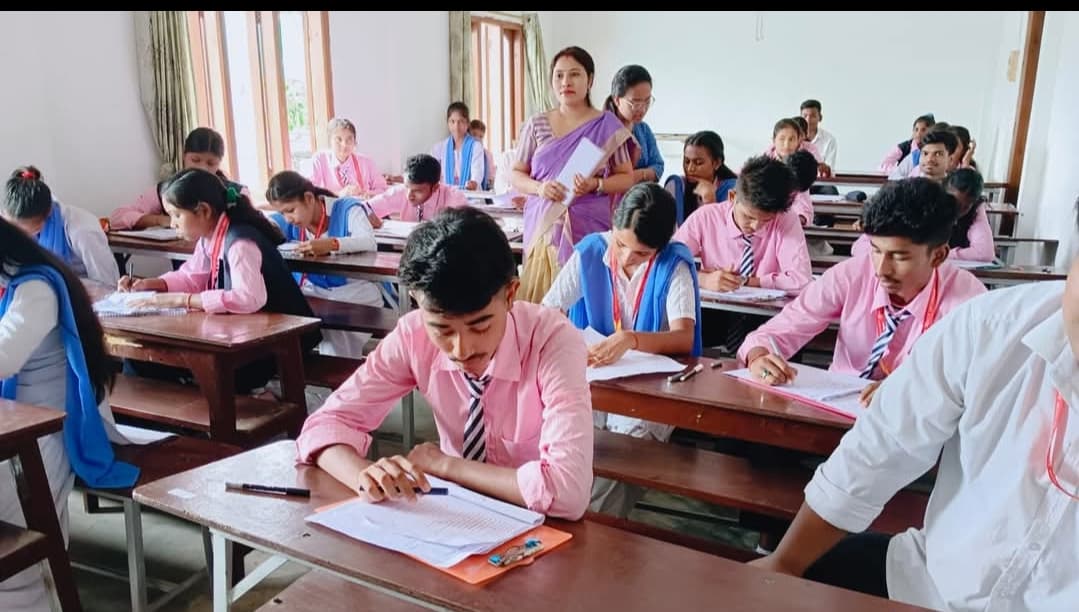 Senior Secondary students of NUR Academy writing an examination in the classroom